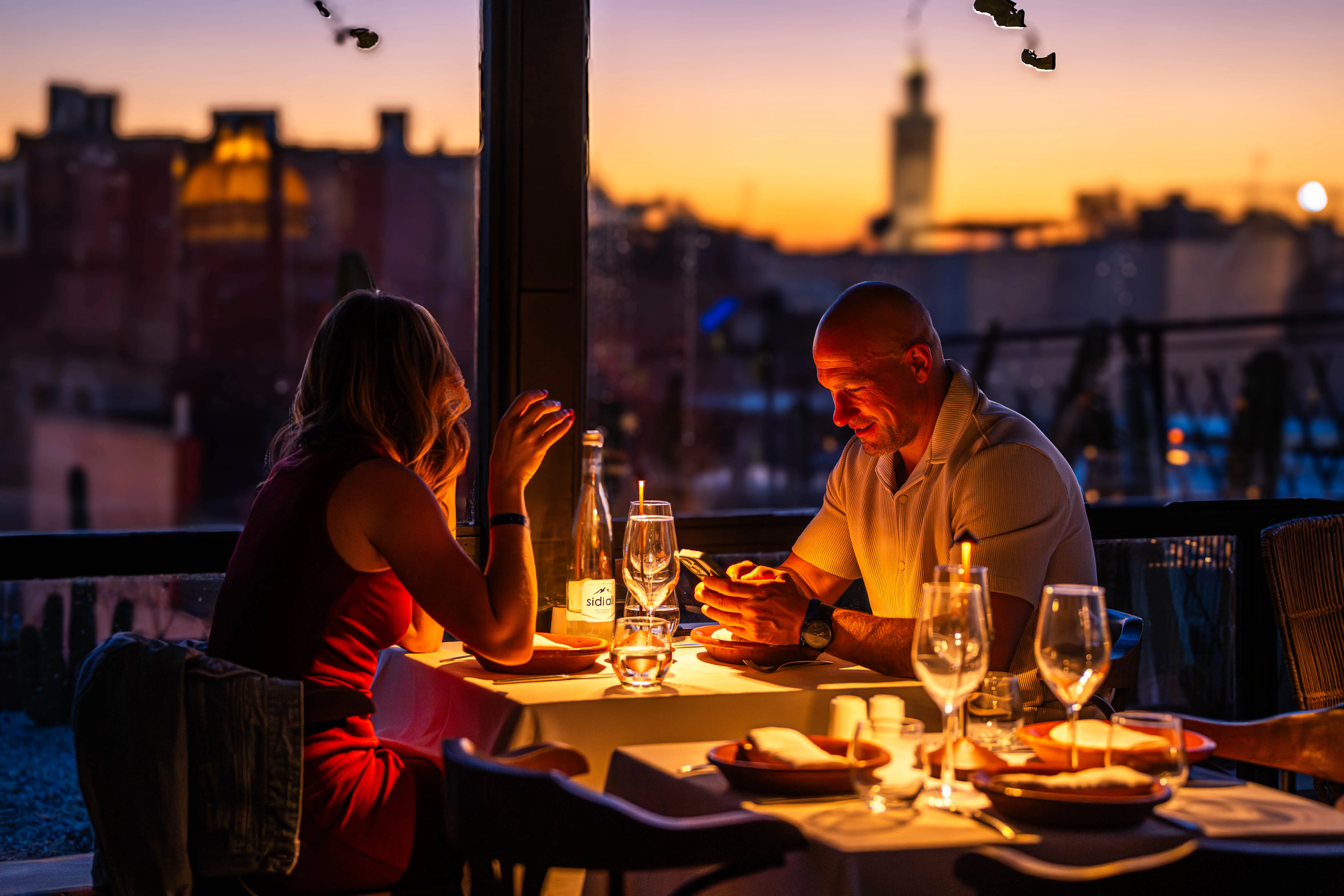 Guests enjoying a sunset dinner show at Le Salama, a top-rated spot in Marrakech